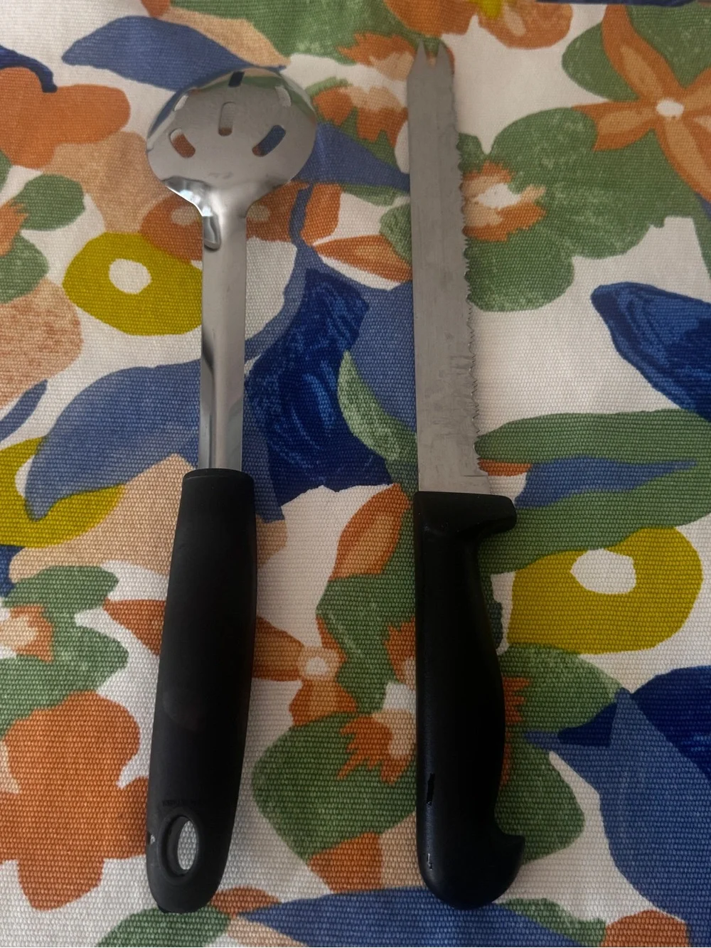 Black-Handled Slotted Serving Spoon and Serrated Knife Set